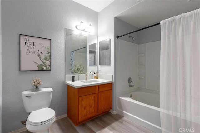 full bathroom featuring toilet, wood-type flooring, vanity, and shower / tub combo with curtain