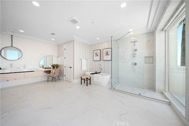 bathroom featuring vanity, crown molding, and shower with separate bathtub