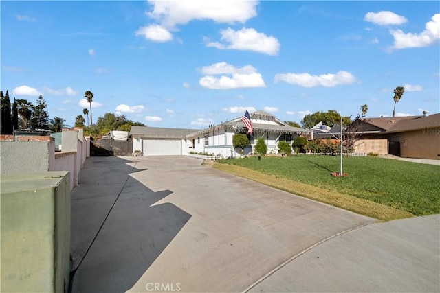 single story home with a front lawn and a garage