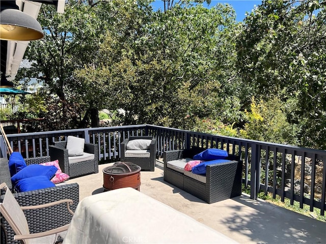 deck with an outdoor hangout area