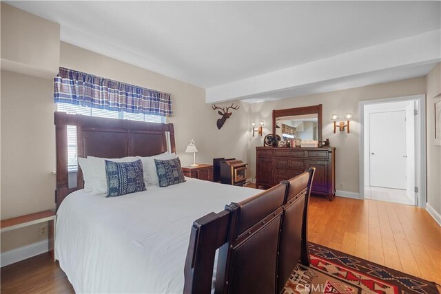 bedroom featuring hardwood / wood-style flooring