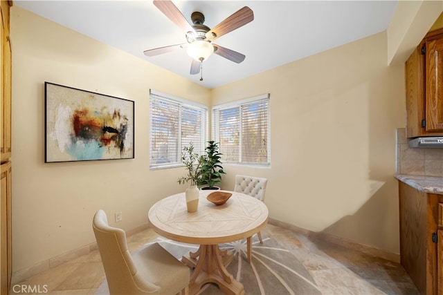 dining room with ceiling fan