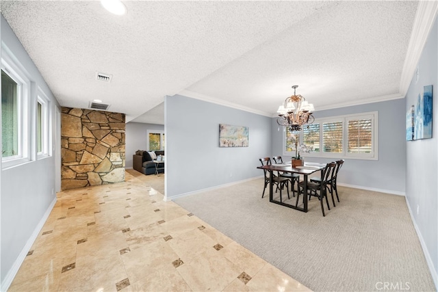 dining area featuring a textured ceiling, a chandelier, and ornamental molding