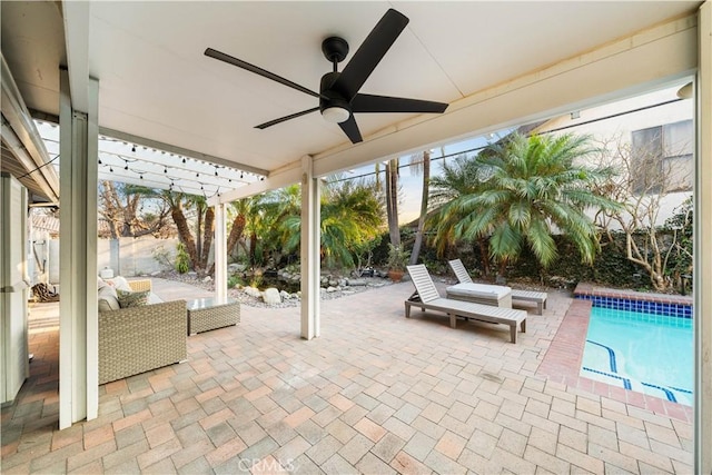 view of patio featuring ceiling fan