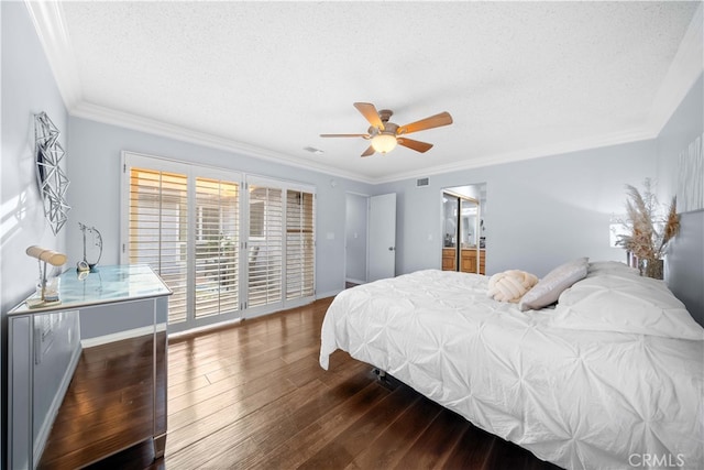 bedroom with dark wood-type flooring, ceiling fan, crown molding, and a textured ceiling