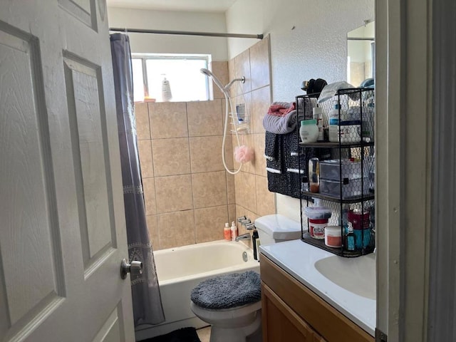 full bathroom with toilet, vanity, and shower / tub combo with curtain