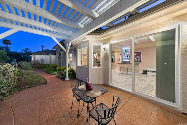 view of patio featuring a pergola