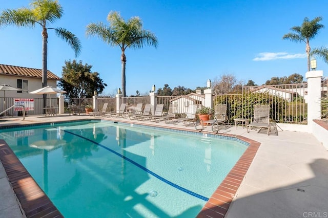 view of swimming pool featuring a patio