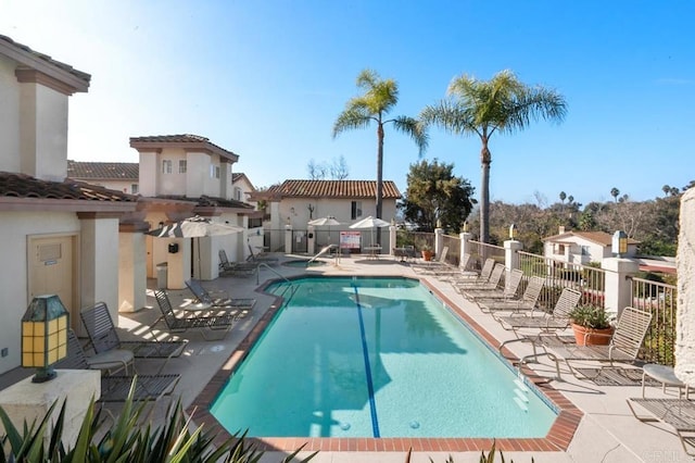 view of swimming pool featuring a patio