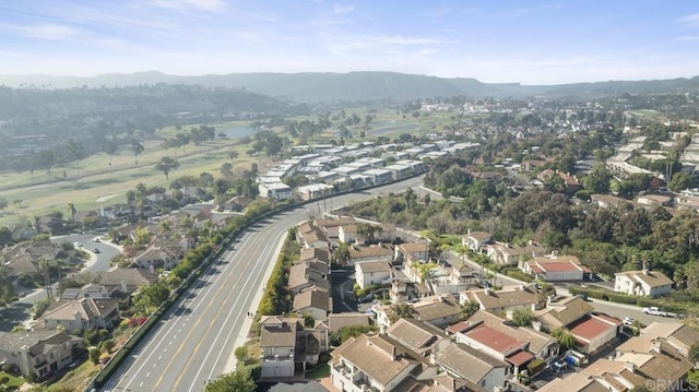 drone / aerial view featuring a mountain view