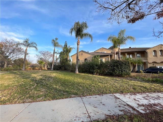 view of home's exterior featuring a lawn