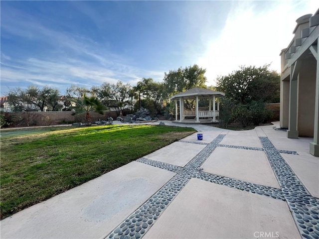 view of yard with a gazebo and a patio area