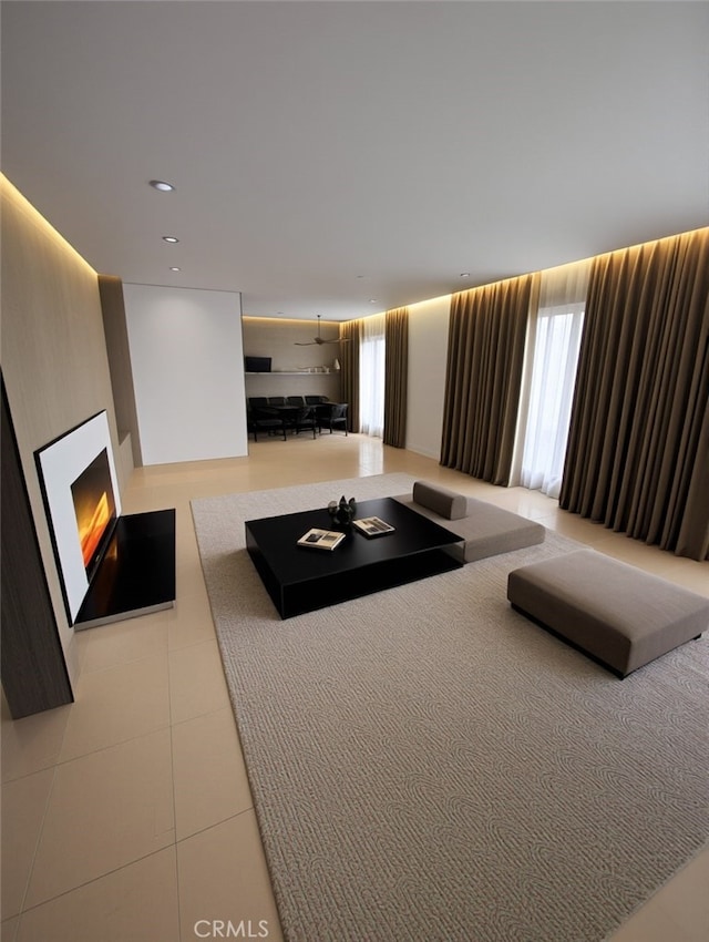 unfurnished living room featuring light tile patterned floors