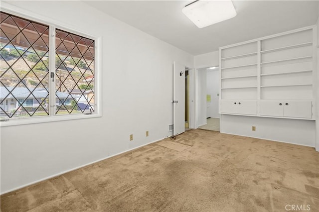 unfurnished bedroom with carpet