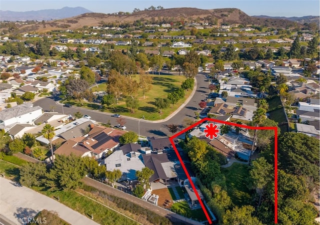 drone / aerial view featuring a mountain view