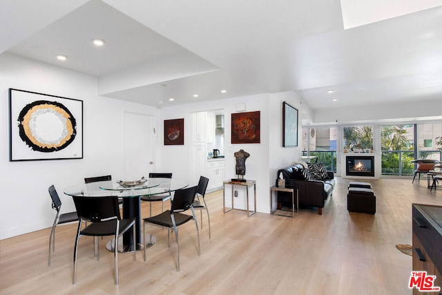 dining room with light hardwood / wood-style floors