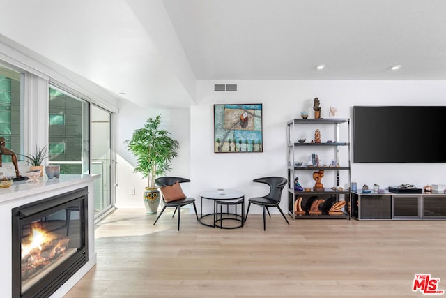 sitting room with light wood-type flooring