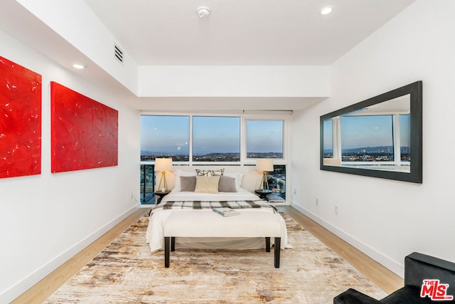 bedroom featuring hardwood / wood-style flooring