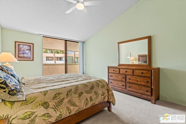 bedroom with light carpet, ceiling fan, access to exterior, a textured ceiling, and expansive windows