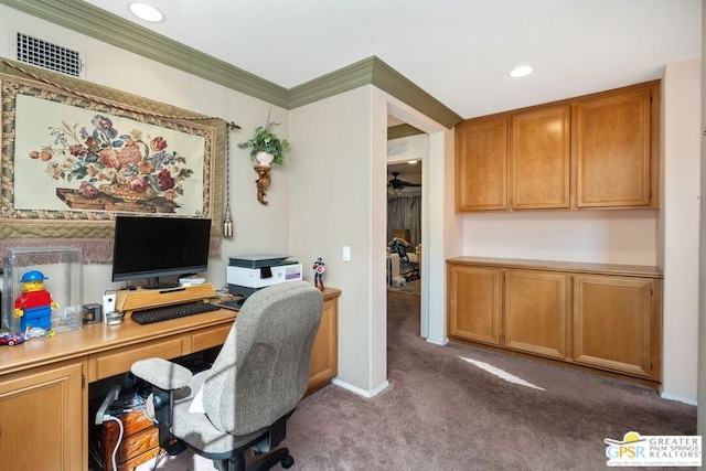 home office with carpet floors and ornamental molding