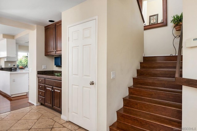 interior space with dark brown cabinetry