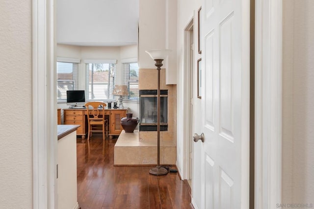 hall with dark hardwood / wood-style floors