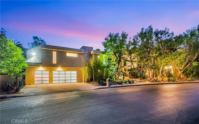 view of front of property with a garage