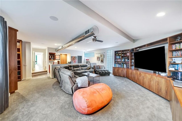 carpeted living area featuring a ceiling fan, beamed ceiling, a wealth of natural light, and recessed lighting