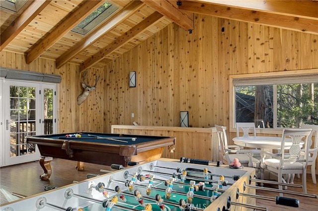 playroom featuring pool table, lofted ceiling with skylight, wood ceiling, and a healthy amount of sunlight