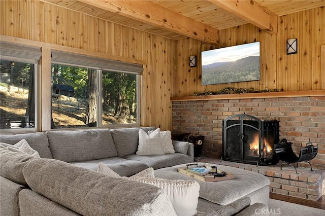 living room featuring wooden ceiling, a fireplace, wooden walls, and beamed ceiling