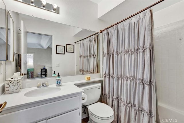 full bathroom featuring toilet, vanity, and shower / tub combo with curtain