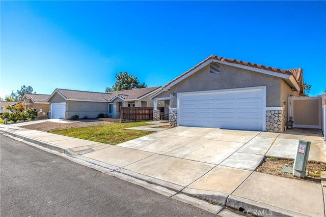 ranch-style house featuring a garage