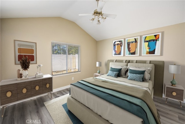 bedroom with dark hardwood / wood-style flooring, vaulted ceiling, and ceiling fan