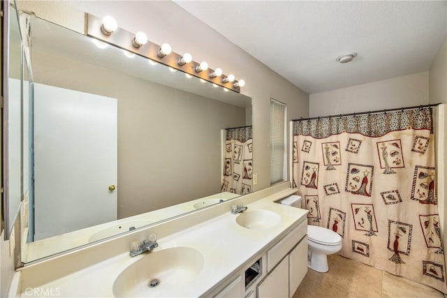 bathroom with vanity, tile patterned flooring, toilet, and a shower with shower curtain