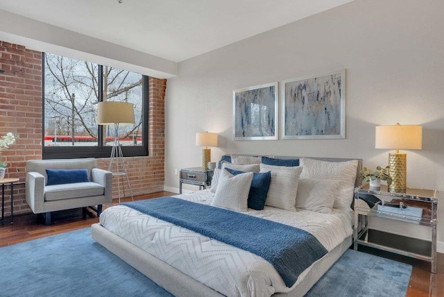 bedroom with dark wood-type flooring