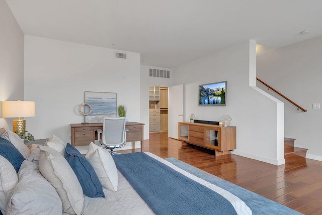 bedroom featuring wood-type flooring