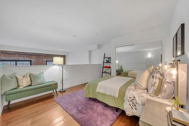 bedroom with wood-type flooring