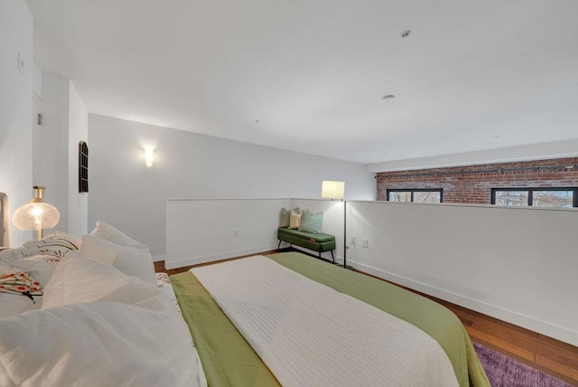 bedroom with wood-type flooring