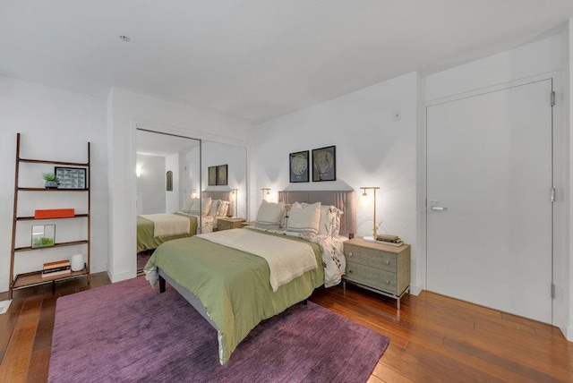 bedroom featuring a closet and hardwood / wood-style flooring