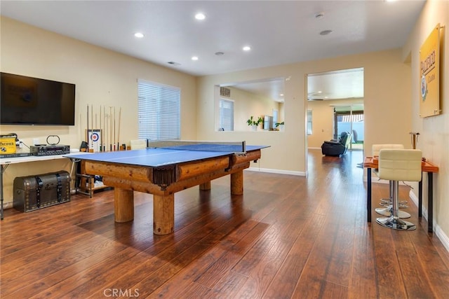 recreation room featuring baseboards, recessed lighting, and hardwood / wood-style flooring