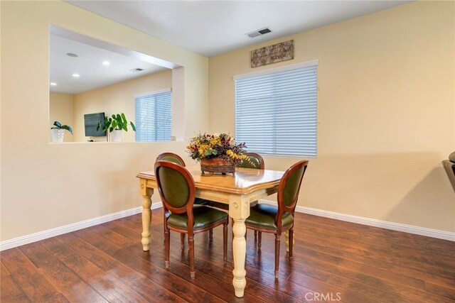 dining space featuring recessed lighting, baseboards, visible vents, and wood finished floors