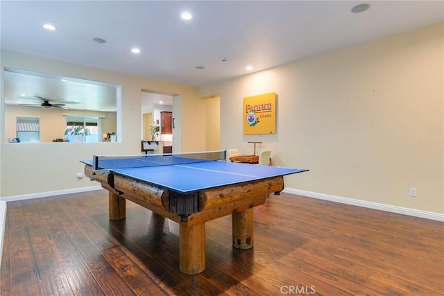 game room featuring ceiling fan and dark hardwood / wood-style flooring