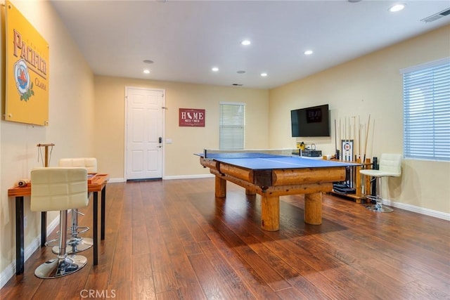 rec room featuring baseboards, recessed lighting, visible vents, and hardwood / wood-style flooring
