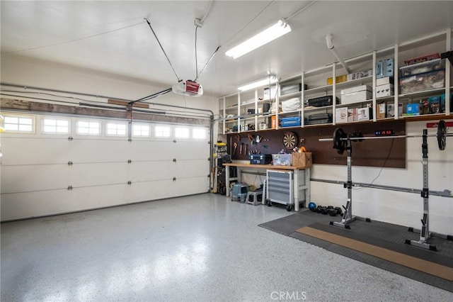 garage featuring a garage door opener