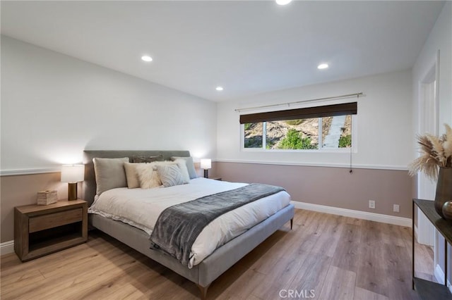 bedroom featuring light hardwood / wood-style floors