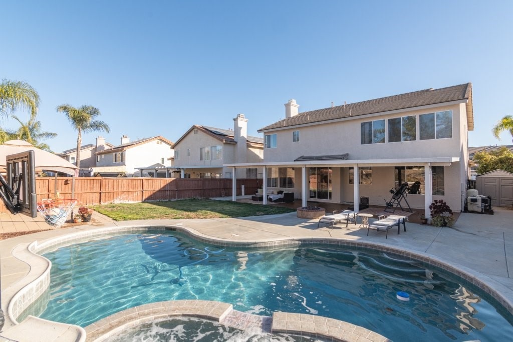 view of swimming pool with a patio