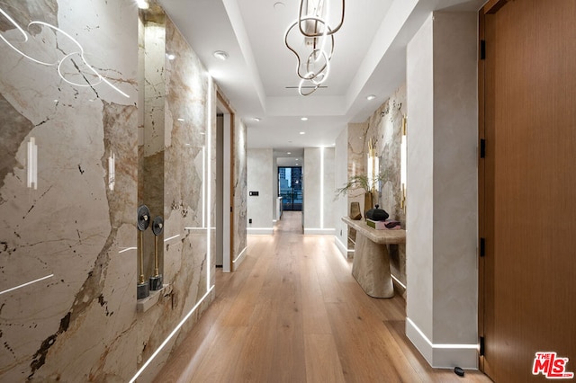 hallway with light wood-type flooring