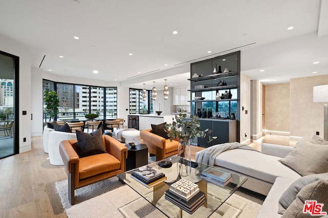 living room with light hardwood / wood-style floors