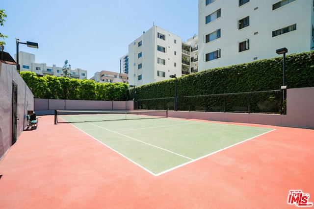 view of tennis court with basketball court