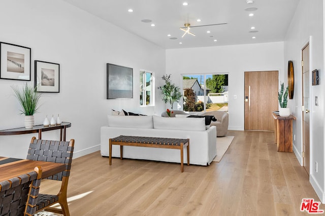 living room with light hardwood / wood-style flooring